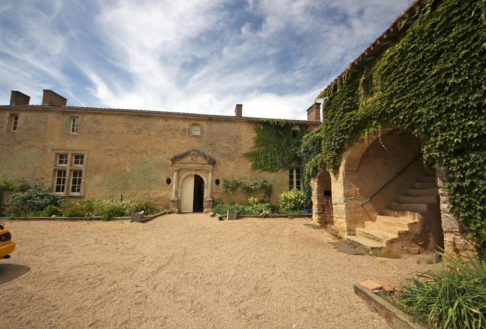 Le Manoir De Gatines Bed & Breakfast Tigne ภายนอก รูปภาพ